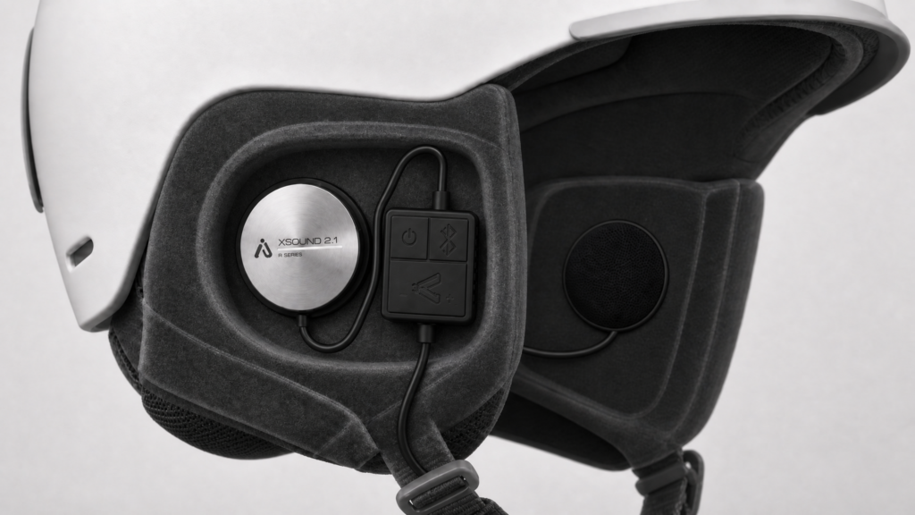 XSound 2.1R Bluetooth helmet speaker installed inside a ski helmet, no headphones needed